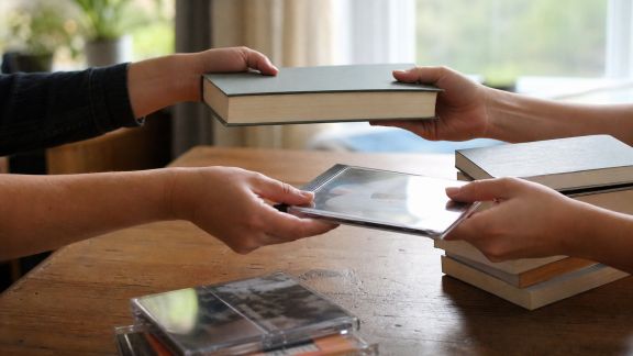 Développer un échange de livres et CD entre voisins