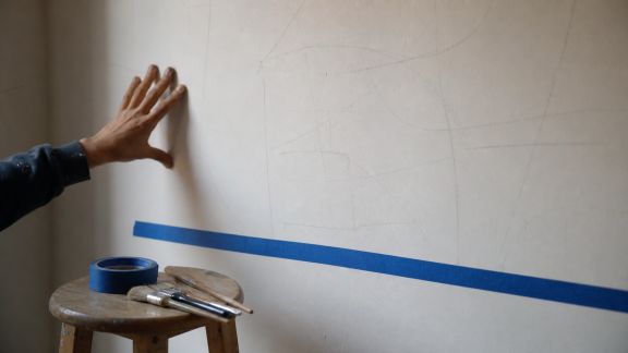 Composer une fresque murale artistique avec des citations de livres et films